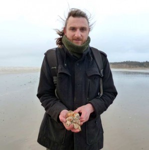 Geoff with some whelks.  Spring low tide at Pett Level.