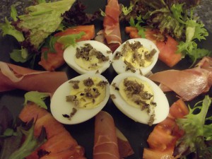 Summer Truffles on boiled egg, with Serrano ham and home-grown Latvian tomatoes